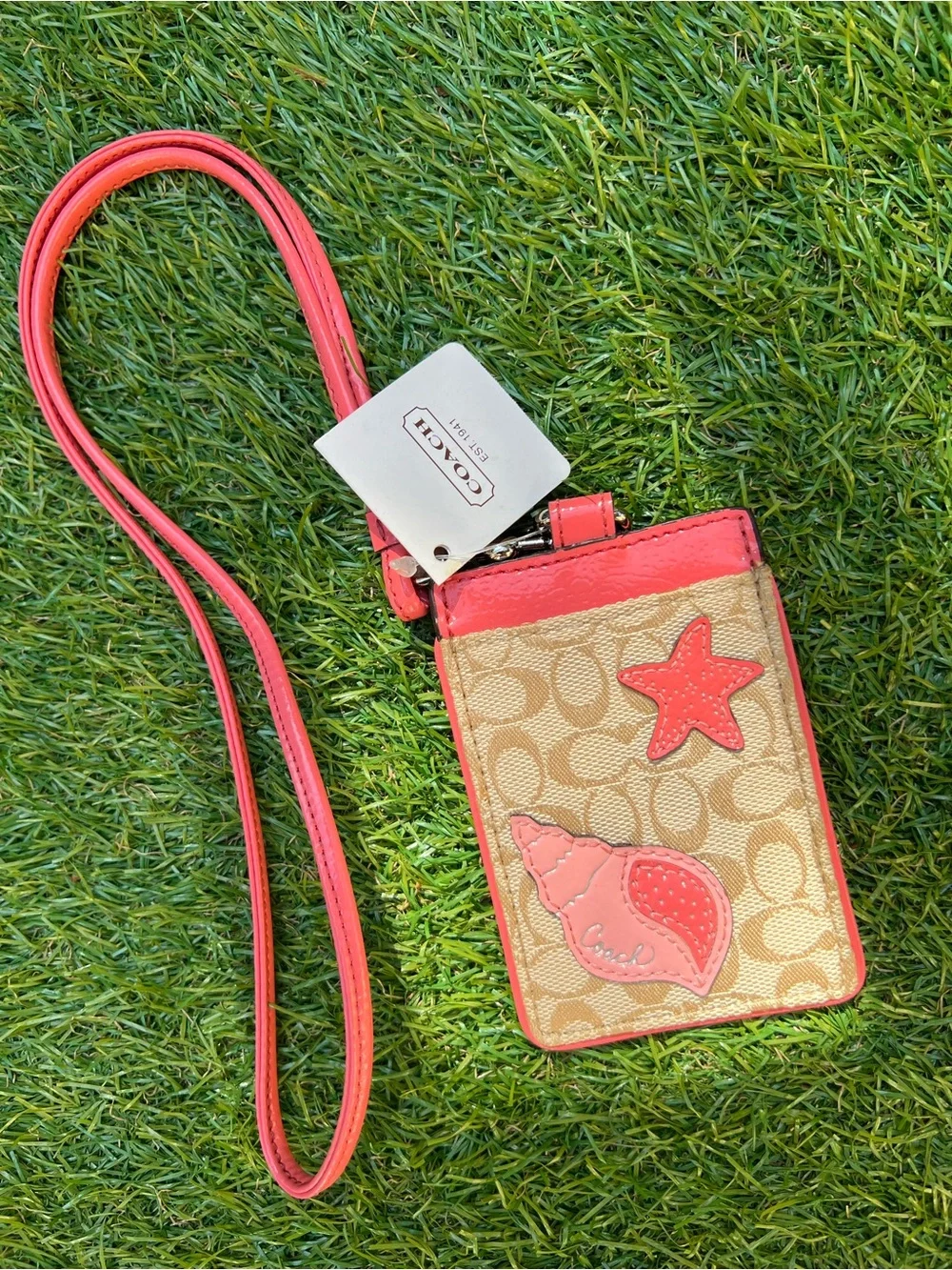 COACH- Signature SEASHELL PINK/BEIGE Lanyard ID # F61591